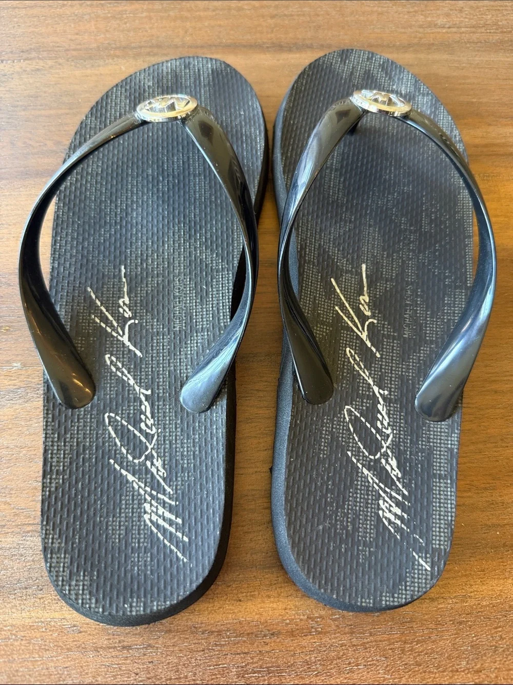 Michael Kors Black and Gold MK Logo Jelly Flip Flop Sandals